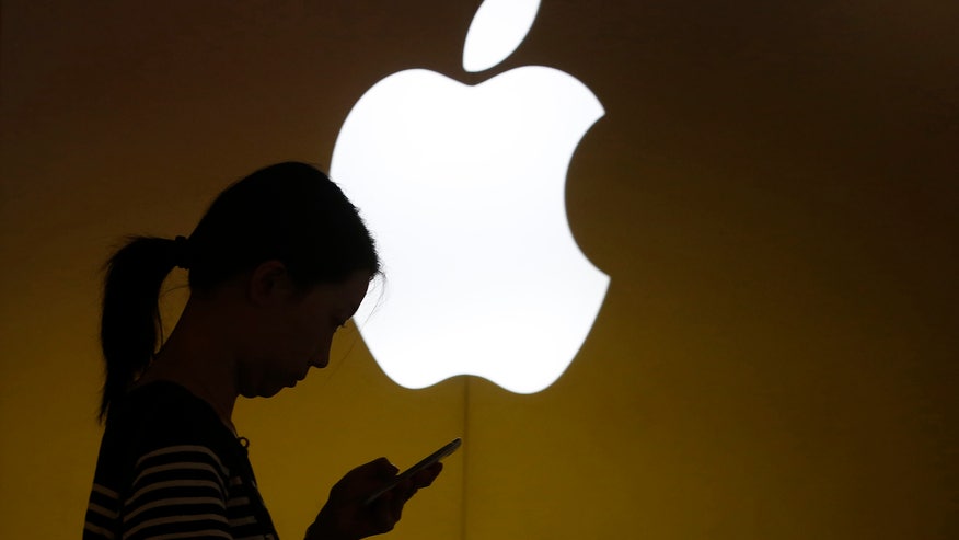 apple-woman-phone-10sept2013